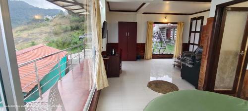 Posezení v ubytování The Jacks Hilltop Resort Kodai
