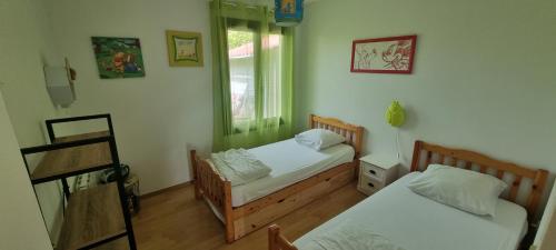 Postel nebo postele na pokoji v ubytování Gîte Xuritenborda 7 personnes avec vue exceptionnelle sur les montagnes basque