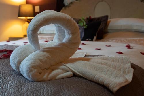 Ένα ή περισσότερα κρεβάτια σε δωμάτιο στο Chinchilla Lodge