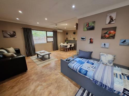 Posezení v ubytování Rhino Cottage