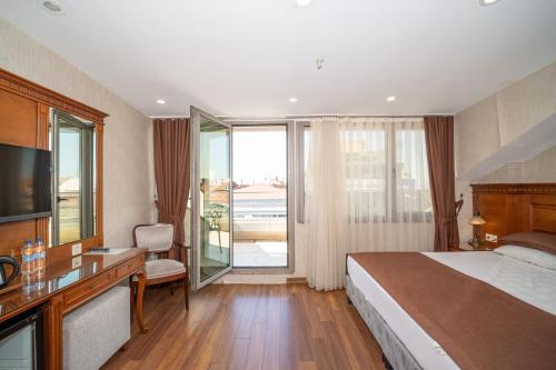 Ένα ή περισσότερα κρεβάτια σε δωμάτιο στο Hotel Blisstanbul