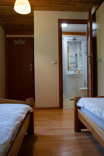Postel nebo postele na pokoji v ubytování Spokój w Górach