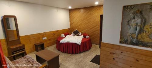 Postel nebo postele na pokoji v ubytování The Jacks Hilltop Resort Kodai