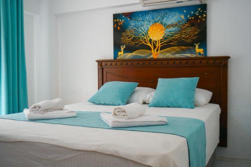A bed or beds in a room at Villa SOLEMARE DEMRE