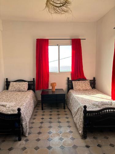Postel nebo postele na pokoji v ubytování Jara Cimrman surf house