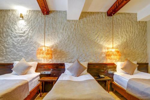 Cama o camas de una habitación en A La Mode Cappadocia