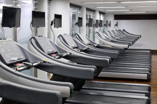a row of treadmills in a gym at Grand Mercure Imperial Palace Seoul Gangnam in Seoul