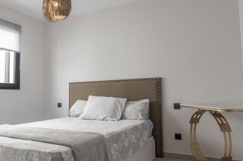 Postel nebo postele na pokoji v ubytování VV El Descanso