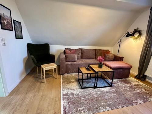Ruang duduk di Ferienwohnung am Wald in der Südheide