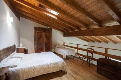 A bed or beds in a room at Cascina Clarabella
