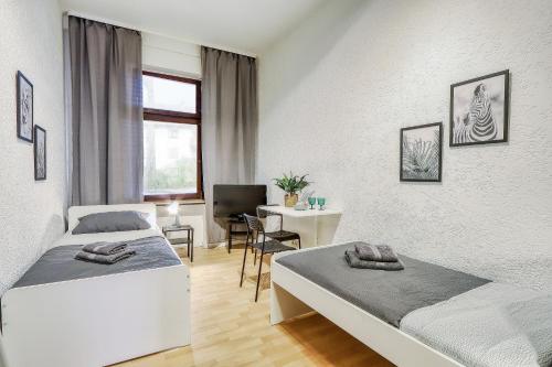 Postel nebo postele na pokoji v ubytování Chic 4 Room Apartment in Mannheim