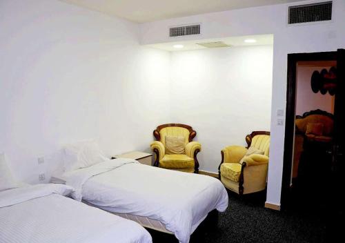 Skylight apartmentsにあるベッド