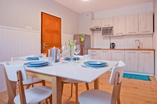 Η κουζίνα ή μικρή κουζίνα στο Apartamenty DobraNocka