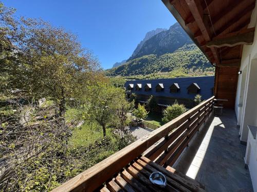 a balcony of a house with a view of a mountain at Boga Alpine Resort in Bogë