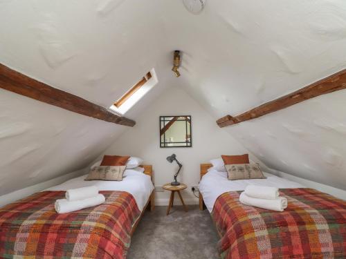 En eller flere senge i et værelse på Lark Rise