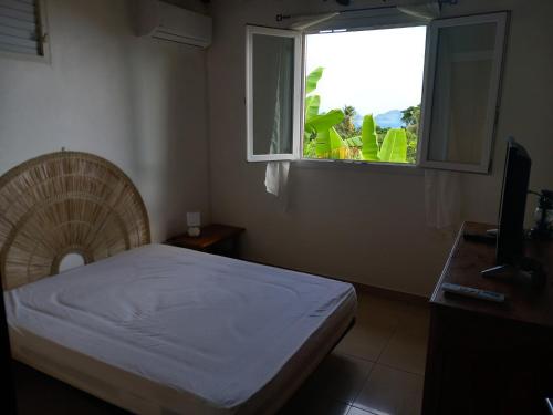 Ένα ή περισσότερα κρεβάτια σε δωμάτιο στο Villa Belle