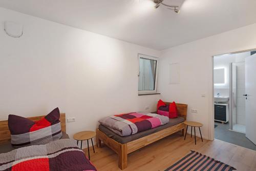 Ένα ή περισσότερα κρεβάτια σε δωμάτιο στο Appartement am Ehrenbach
