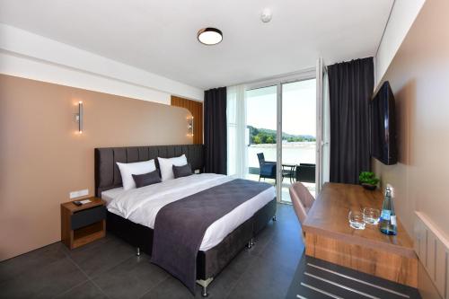 Postel nebo postele na pokoji v ubytování Korki's Motel