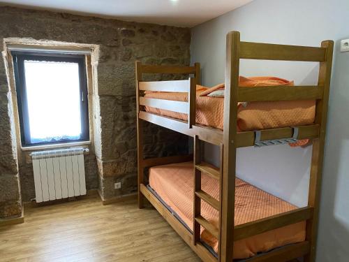 Ένα ή περισσότερα κρεβάτια σε δωμάτιο στο Casa dos Duques