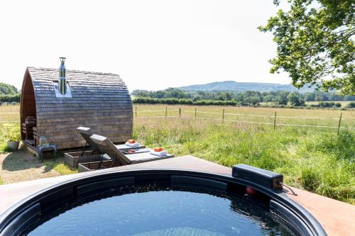 a hot tub in the back of a car at Cabin Westerlands in Selham