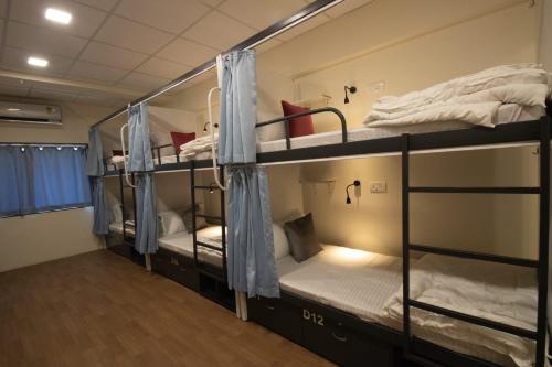 Postel nebo postele na pokoji v ubytování Hostells