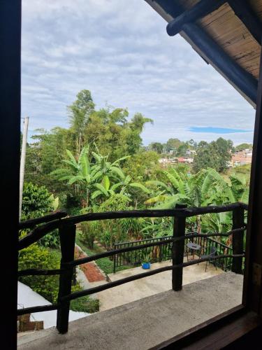 Un balcón o terraza en Coffee Tree Boutique Hostel