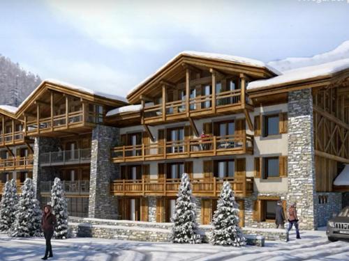 Spacieux 4 pièces avec cheminée, balcon et parking à Val-d'Isère