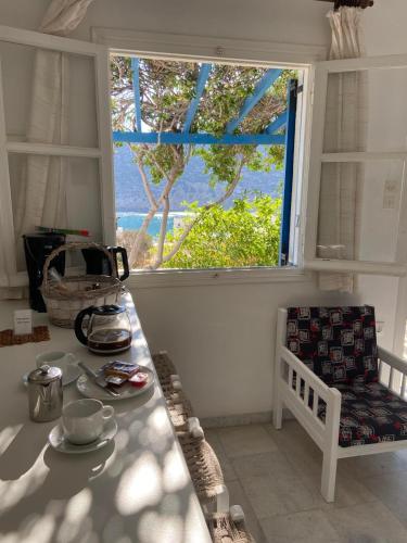 Χώρος καθιστικού στο Flora's Apartments