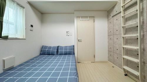 Katil atau katil-katil dalam bilik di Tokyo Sakura hotel