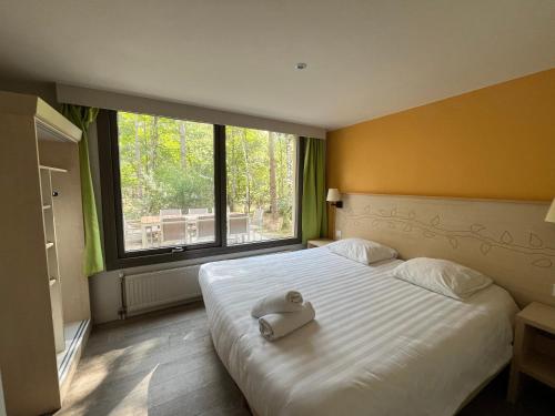 Ένα ή περισσότερα κρεβάτια σε δωμάτιο στο Cottage 8P-Les hauts de bruyères-717