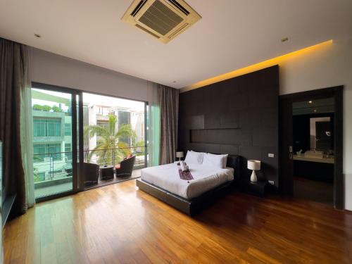 Ένα ή περισσότερα κρεβάτια σε δωμάτιο στο Fantastic SeaView 4br Private Pool Villa