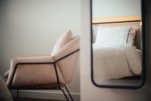 Ένα ή περισσότερα κρεβάτια σε δωμάτιο στο Amario Suites Hotel