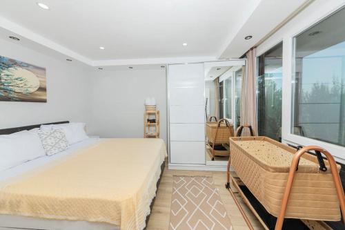 Postel nebo postele na pokoji v ubytování Super Exclusive Bungalow Vacation