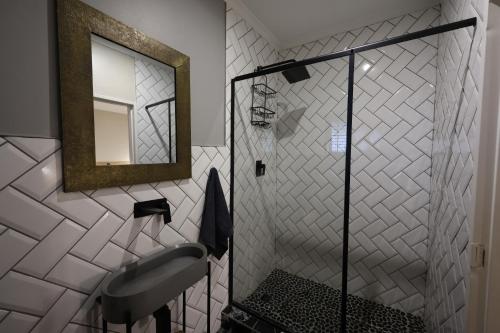 Un baño de Hilton Guest House