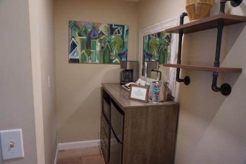 a kitchen with a counter and a counter top at Bleu Beach Resort in Indialantic