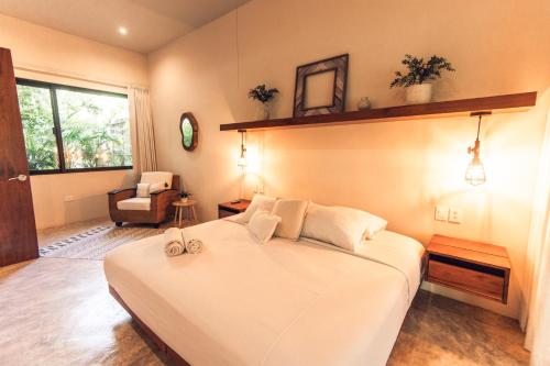Nomad Humans Coliving Apartmentsにあるベッド