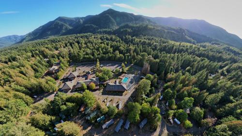 an aerial view of a house in the middle of a forest at Mount Hood Village in Welches