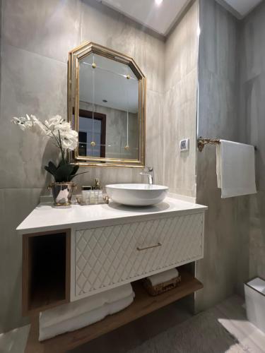 Koupelna v ubytování Luxueux appart-hotel