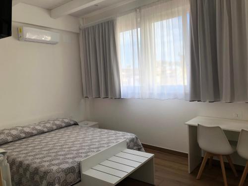 Ένα ή περισσότερα κρεβάτια σε δωμάτιο στο Vico Palazzo
