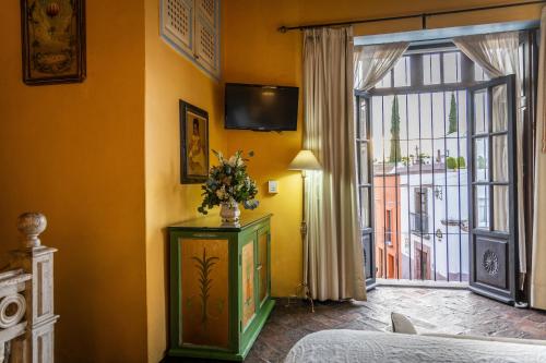 Katil atau katil-katil dalam bilik di Casa Schuck Boutique Hotel