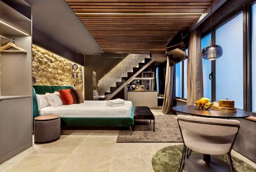 Ένα ή περισσότερα κρεβάτια σε δωμάτιο στο LUXURY EVOLUTION ROOMS
