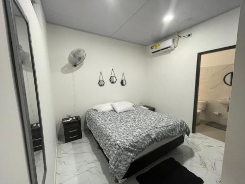 Ένα ή περισσότερα κρεβάτια σε δωμάτιο στο Apartamento central- Río Agencia