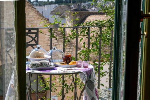 Un balcón o terraza en Dimora Violetta