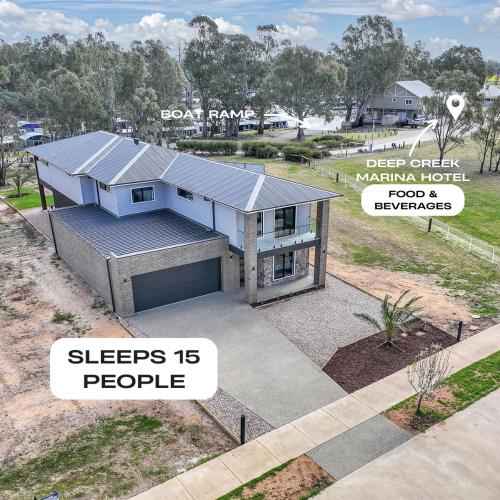 an image of a house with the words sleeps people at Marina Palms - Your Luxury Escape in Torrumbarry