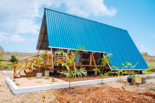 Κήπος έξω από το Cozy A-Frame Cabin Eco Stay by Nungwi Beach