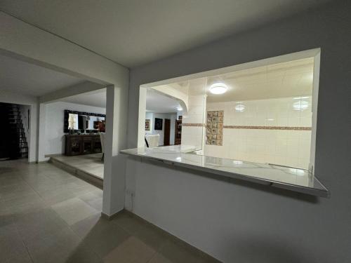 a room with a glass counter in a room with at Casa San Gabriel in Silvania
