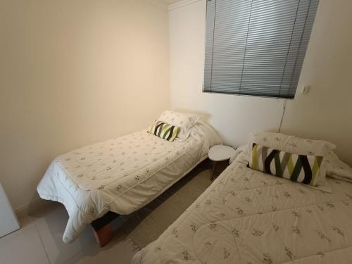Ein Bett oder Betten in einem Zimmer der Unterkunft Concon Amazing Ocean View en primera linea