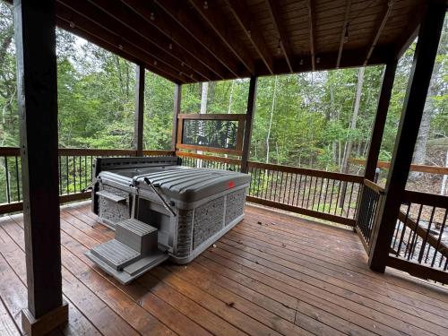 Luxe Cabin with Game Room, Hot Tub & Firepit photo 40