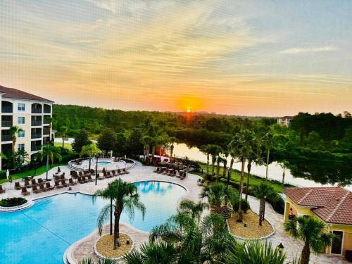 an aerial view of a pool at a resort at Luxurious & Epic Condo in heart of Orlando in Orlando