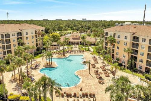 an aerial view of a pool at a resort at Luxurious & Epic Condo in heart of Orlando in Orlando